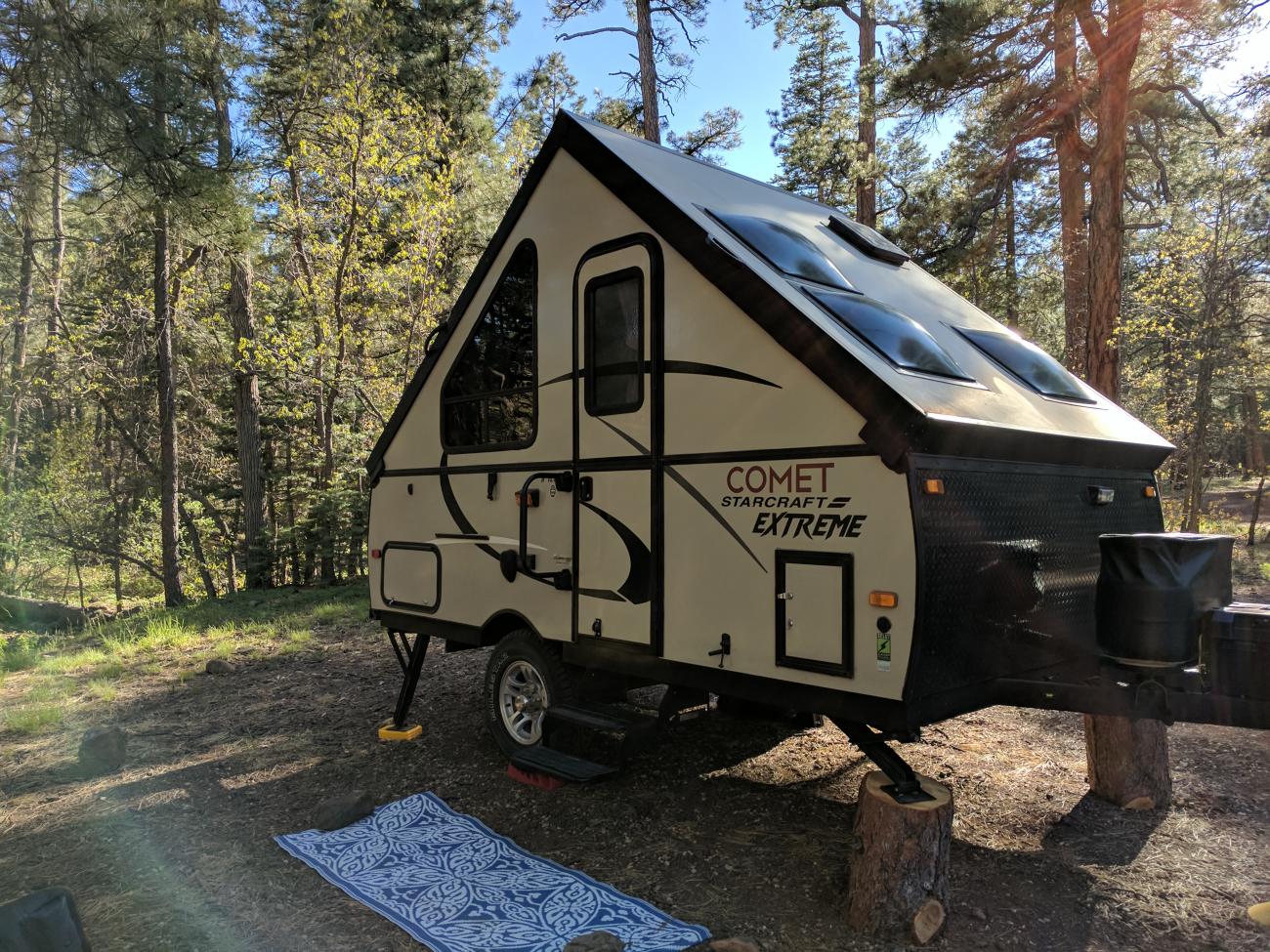 A-frame pop-up camper in the woods